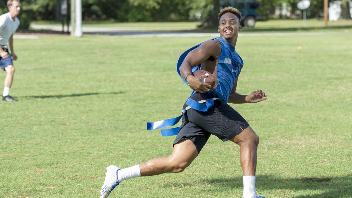 students playing flag football