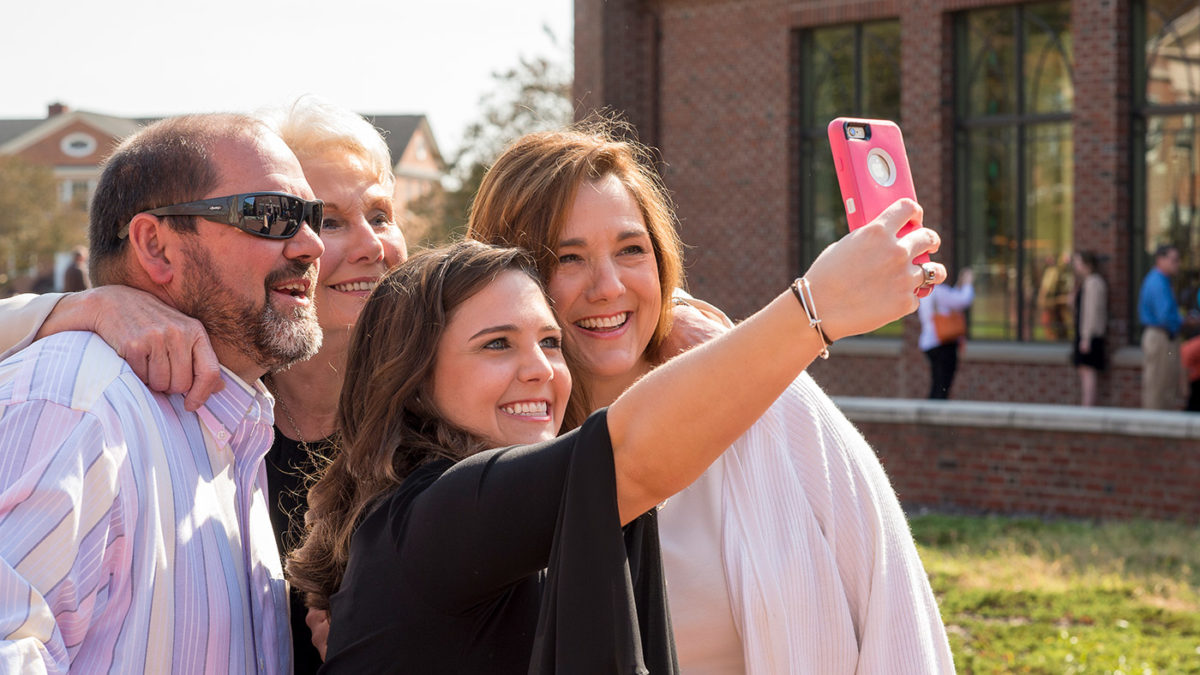image of family with Campbell University student