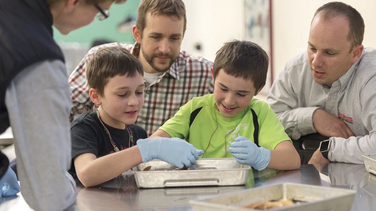 image of student teachers and children