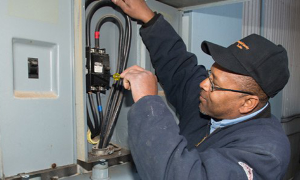 image of man doing maintenance