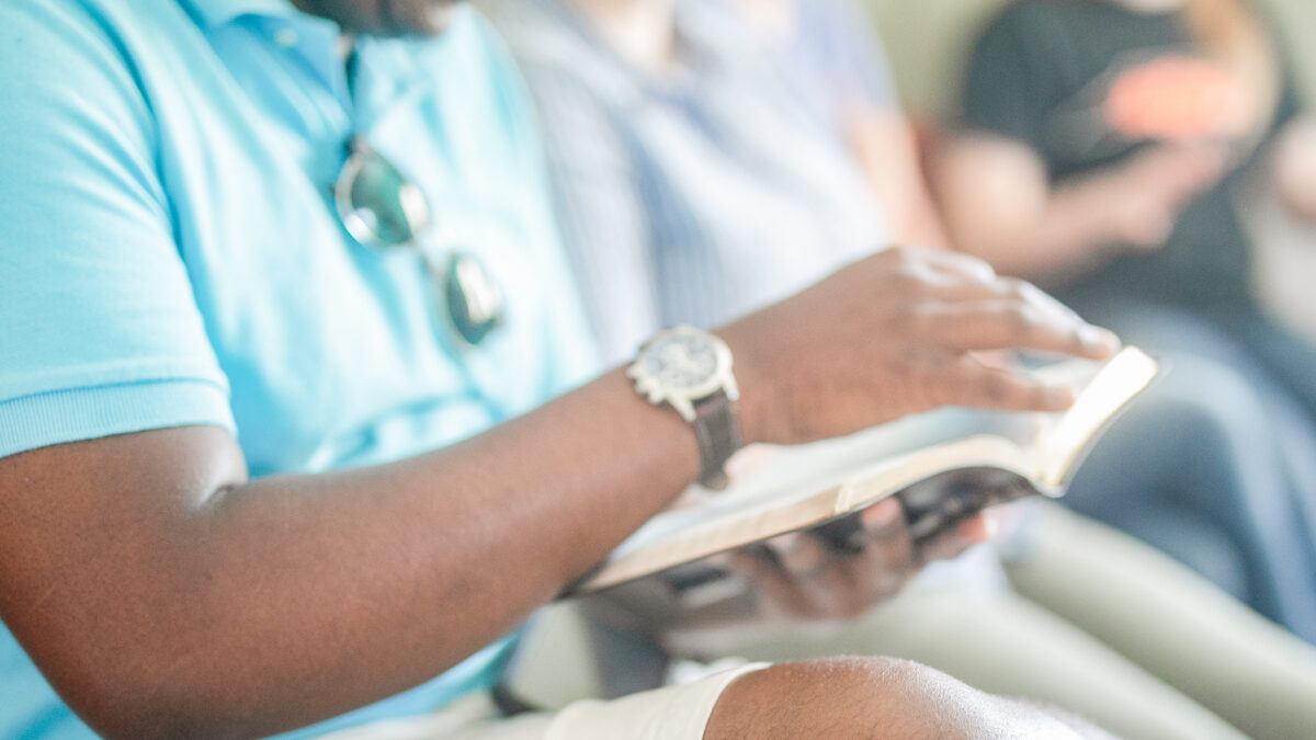 student reading the Bible